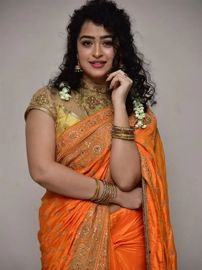 Actress Apsara Rani in Orange Saree at Talakona Movie Launch